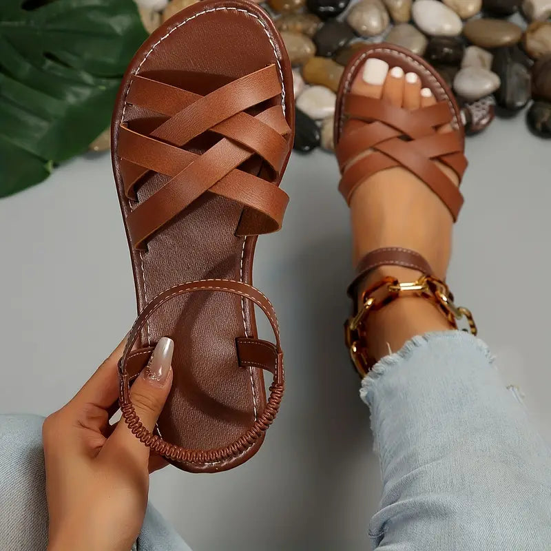 Women's comfy crisscross slip-on sandals with secure backband, ideal for casual summer wear.