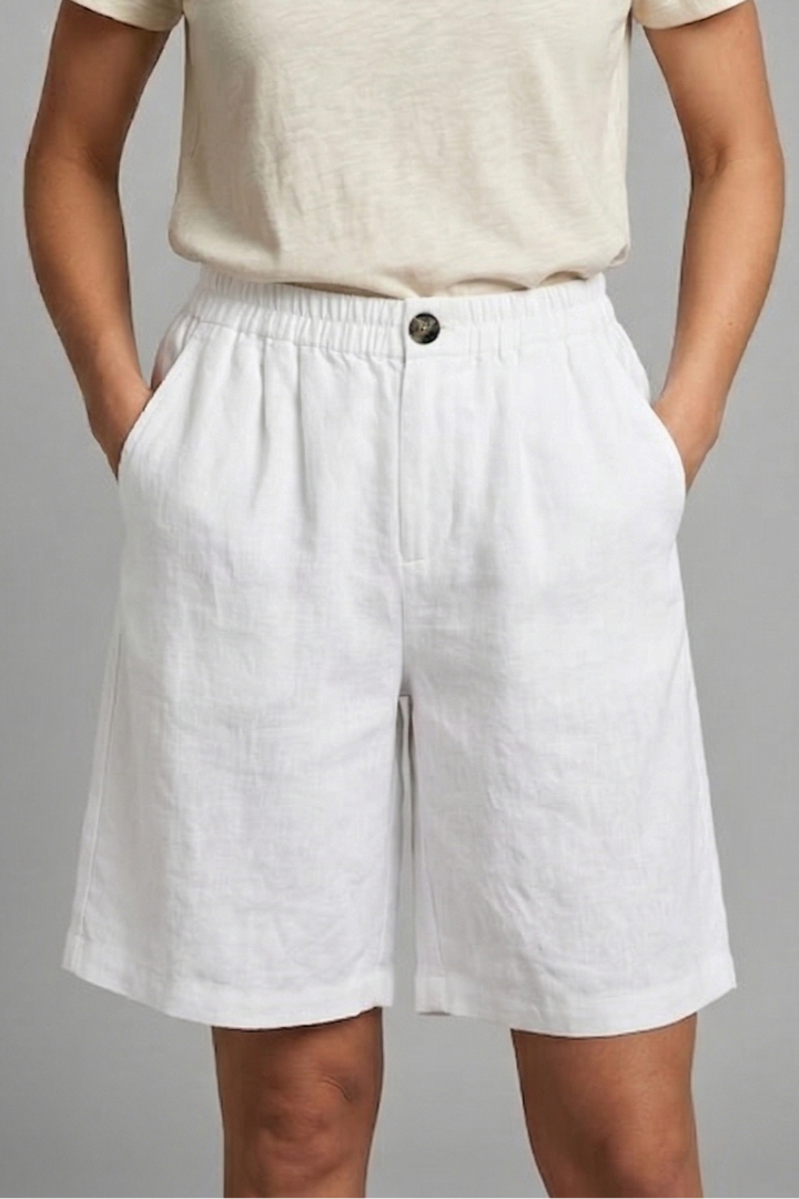 Mid-length women's active shorts with an elastic waist, drawstring, and practical side pockets.