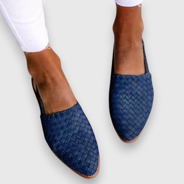 Women's comfortable flat sandals for all-day wear. Ergonomic, open-toe design provides ultimate summer comfort.