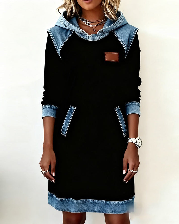 Women's hooded casual streetwear dress. Comfortable, chic, and versatile for a modern urban look.