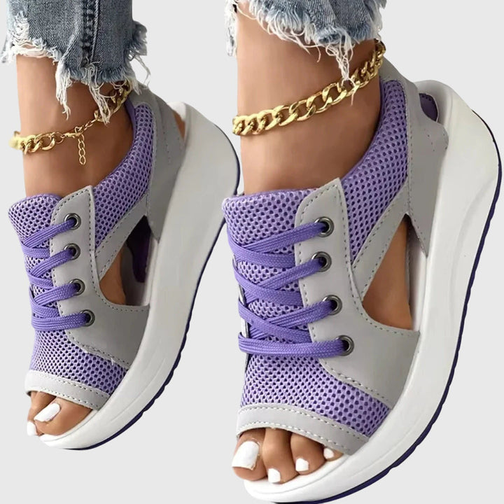 Fashionable women's slip-on sandals, ideal for holidays & warm weather. Comfy, open-toe design for casual wear.