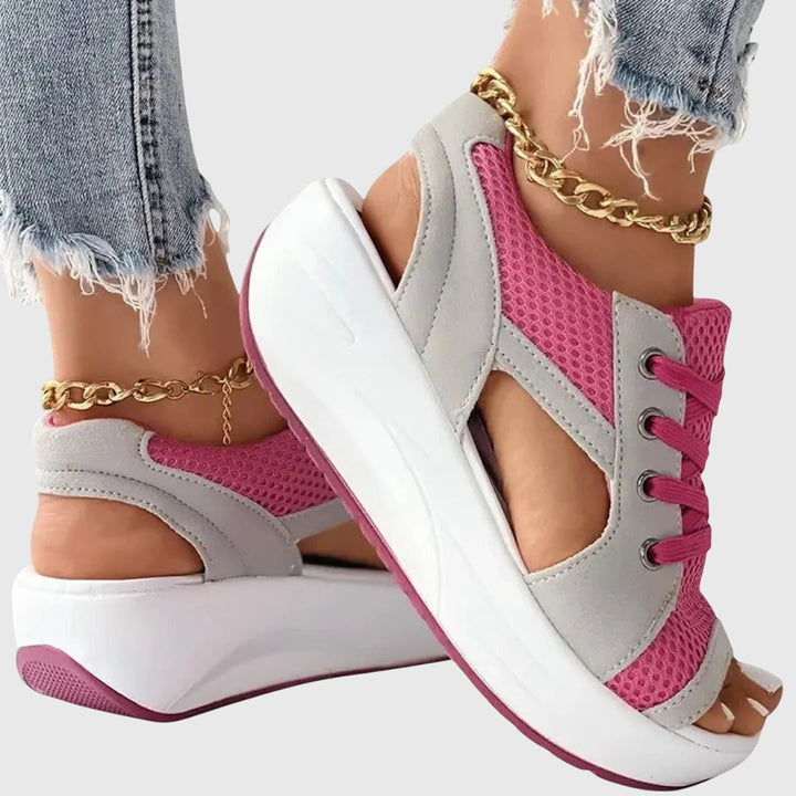 Close-up of women's comfy slip-on sandals. Cushioned, lightweight, open-toe, perfect for summer casual wear.
