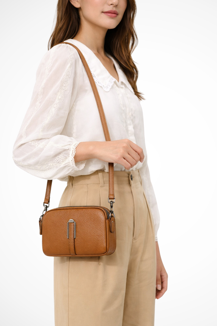 Women's compact double zip crossbody bag, perfect for everyday essentials & organized storage.