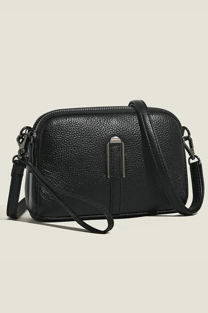 Elegant women's double zip shoulder bag, a compact and organized fashion statement.