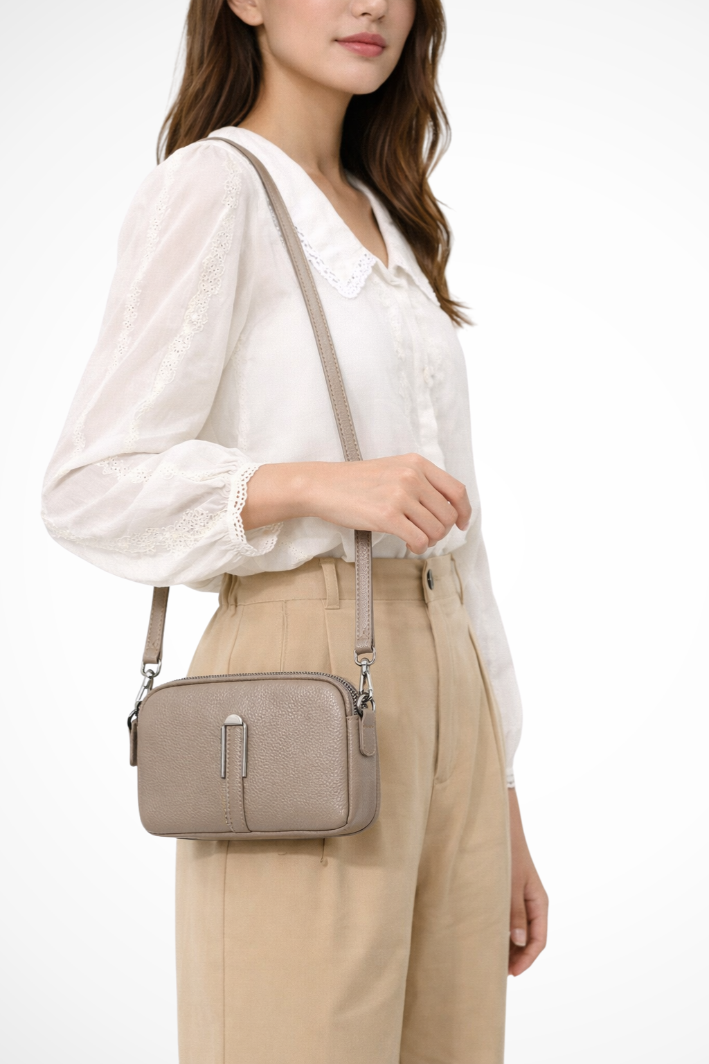 Sleek compact double zip crossbody shoulder bag, perfect for organized women on the go.