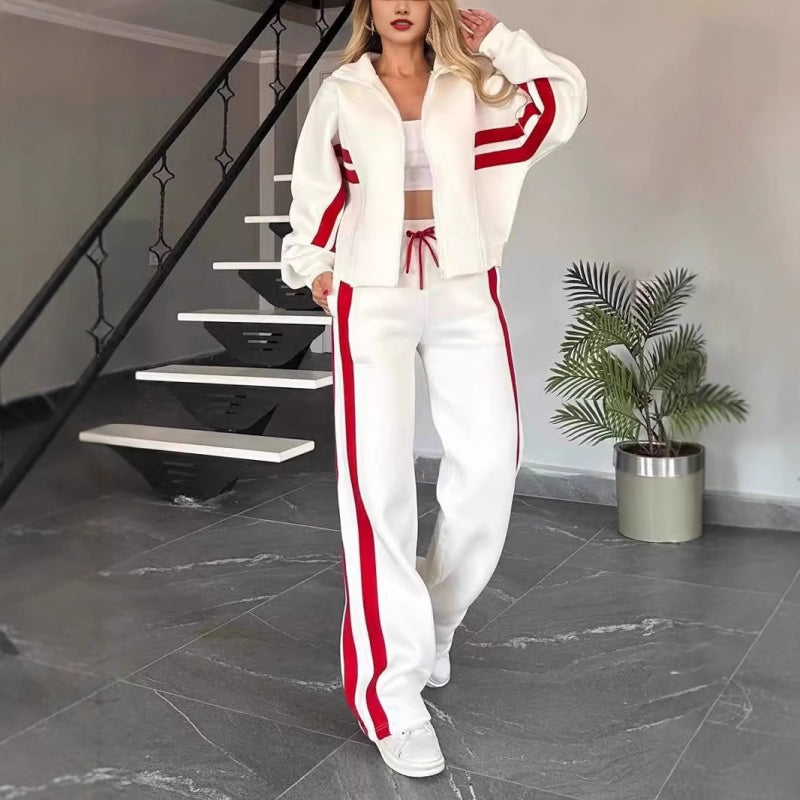 Women's contrast stripe zip-up lounge tracksuit set. Comfortable two-piece casual wear for sporty chic style.