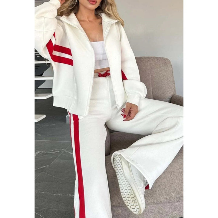 Stylish women's zip-up activewear jacket with contrast stripes. Perfect for a sporty chic lounge set.