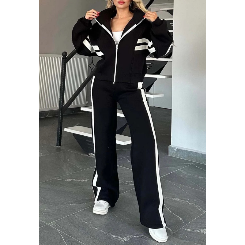Comfortable wide-leg lounge pants with contrast stripes, part of a women's two-piece tracksuit set.