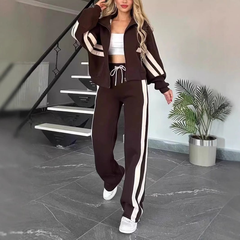 Soft, comfortable women's zip-up tracksuit set. Wide-leg lounge pants and stripe top for everyday casual wear.