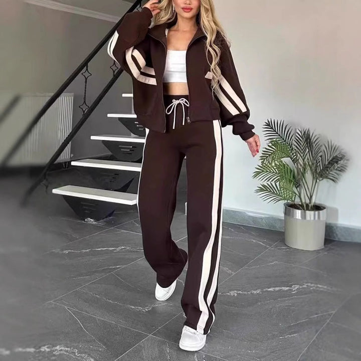 Soft, comfortable women's zip-up tracksuit set. Wide-leg lounge pants and stripe top for everyday casual wear.