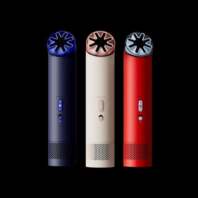 Women's cordless travel hair dryer with diffuser for portable styling, ion care for frizz control & smooth hair.
