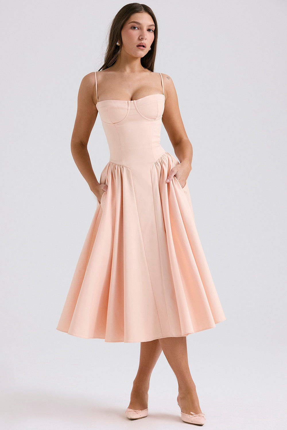 Feminine corset midi dress for women with delicate spaghetti straps and a flattering fitted silhouette.