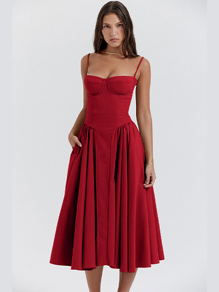 Sophisticated women's occasion dress, mid-length with corset detail and adjustable spaghetti straps.