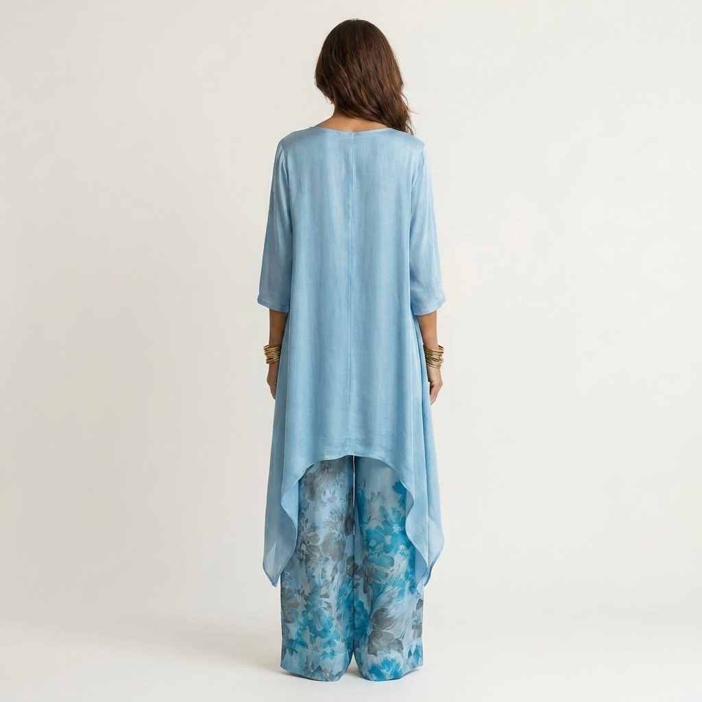 Comfortable women's cotton-silk two-piece set featuring a stylish asymmetric tunic and relaxed pants.