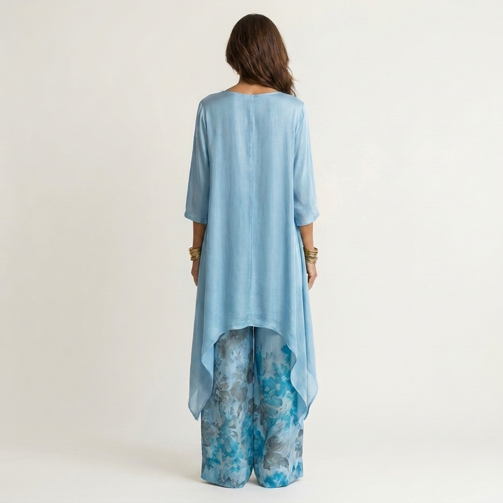 Comfortable women's cotton-silk two-piece set featuring a stylish asymmetric tunic and relaxed pants.