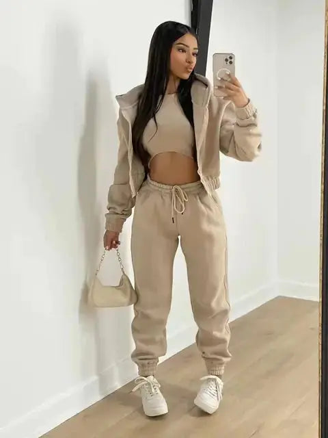 Women's cozy 3-piece loungewear set with hoodie, bralette & joggers. Perfect for relaxed comfort & style.