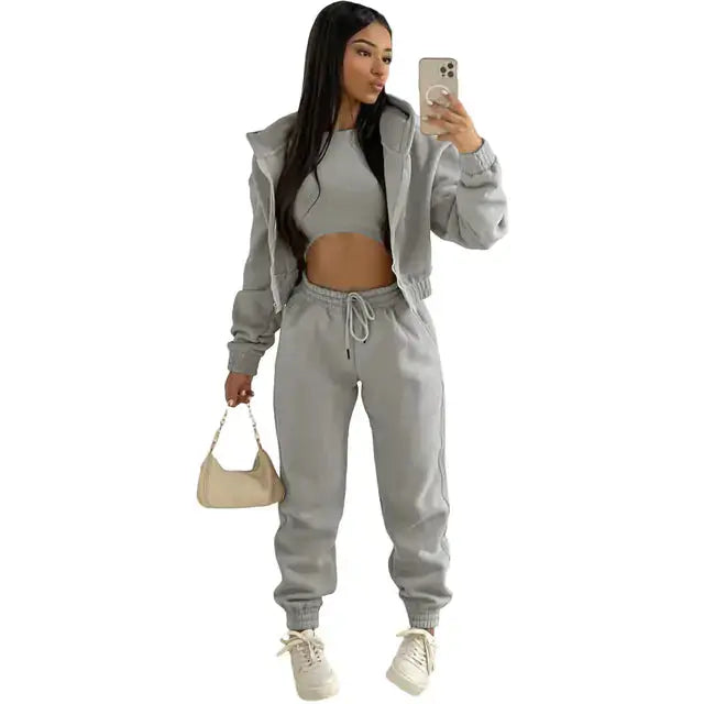 Women's fashionable 3-piece loungewear: hoodie, bralette, and joggers for effortless style.