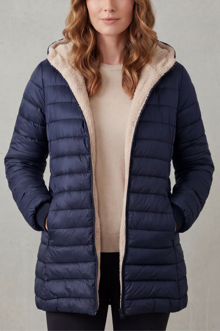 Red women's cozy winter coat with hood, offering stylish warmth for cold weather.