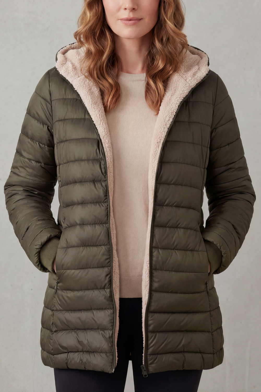 Dark blue women's warm hooded outerwear, a comfortable winter jacket for chilly days.
