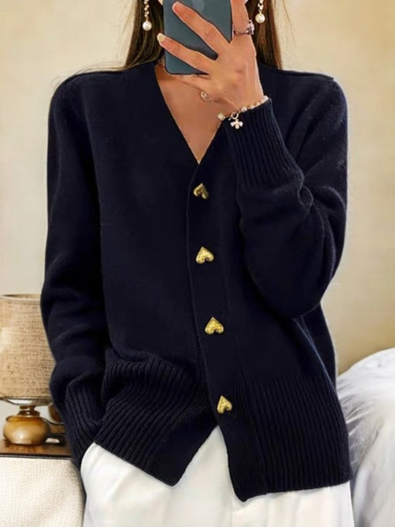 Women's cozy button-front winter cardigan, perfect for elegant layering or casual chic outfits.