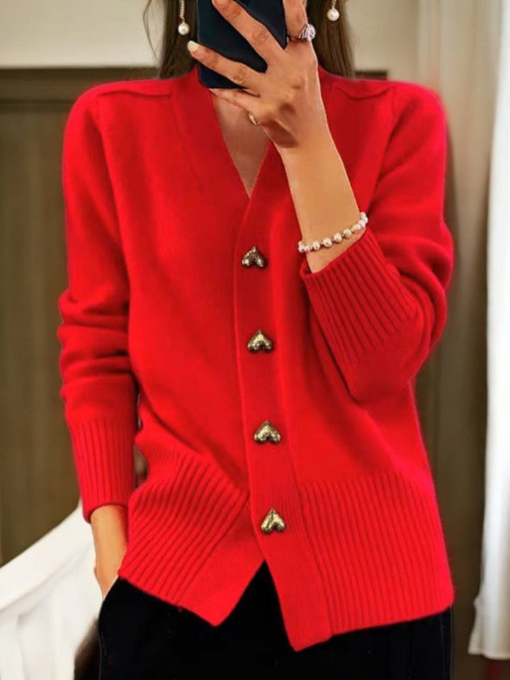 Stylish button-front winter cardigan for women. Cozy long-sleeve knit sweater for elegant casual & comfy winter looks.