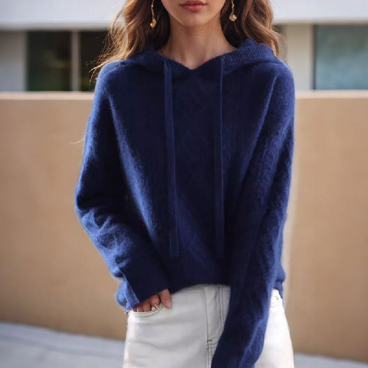 Warm cable knit hooded pullover sweater for women. Ideal cozy winter wear & comfortable casual style.