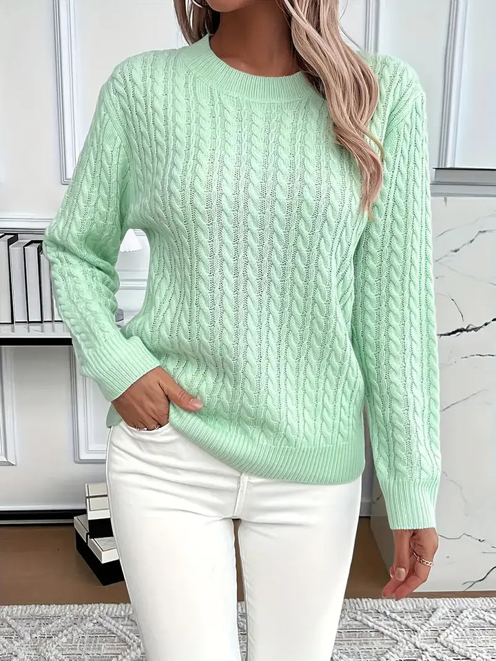 Elegant women's long sleeve cable knit sweater, cozy knitwear for winter warmth & stylish autumn layering.
