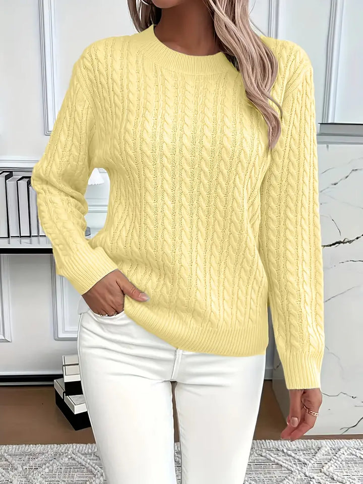 Chic women's cable knit sweater, elegant knitwear for a layered look or stand-alone autumn and winter style.