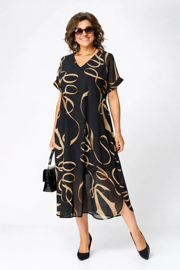 Comfortable women's relaxed fit midi dress, soft fabric and long sleeves for cozy fall & winter fashion.