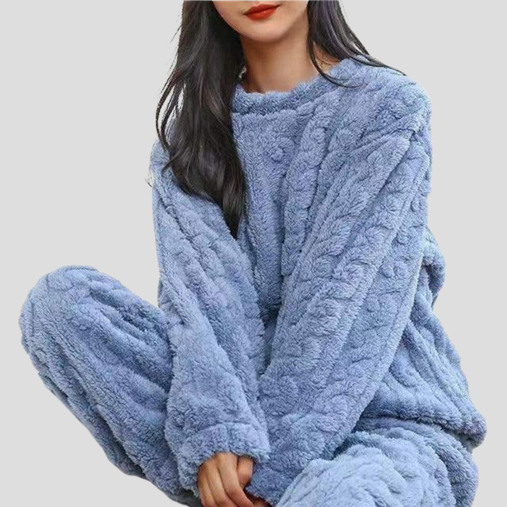Women's cozy fleece pajama set in soft, warm fabric for ultimate comfort. Perfect winter loungewear & sleepwear.