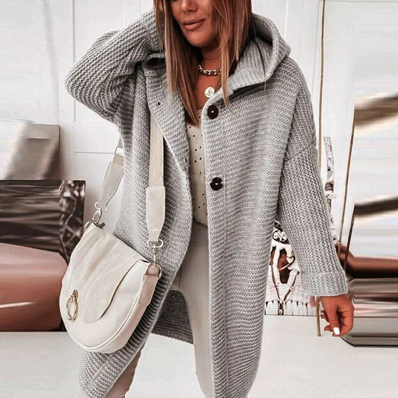 Women's cozy hooded longline cardigan sweater, perfect for fall and winter layering.