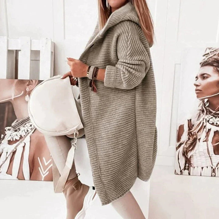 Women's hooded long cardigan, a new cozy sweater for casual wear and stylish layering.