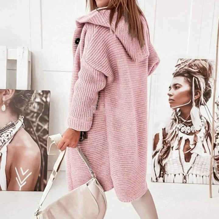Elegant women's longline hooded cardigan, a comfortable and warm winter outerwear option.