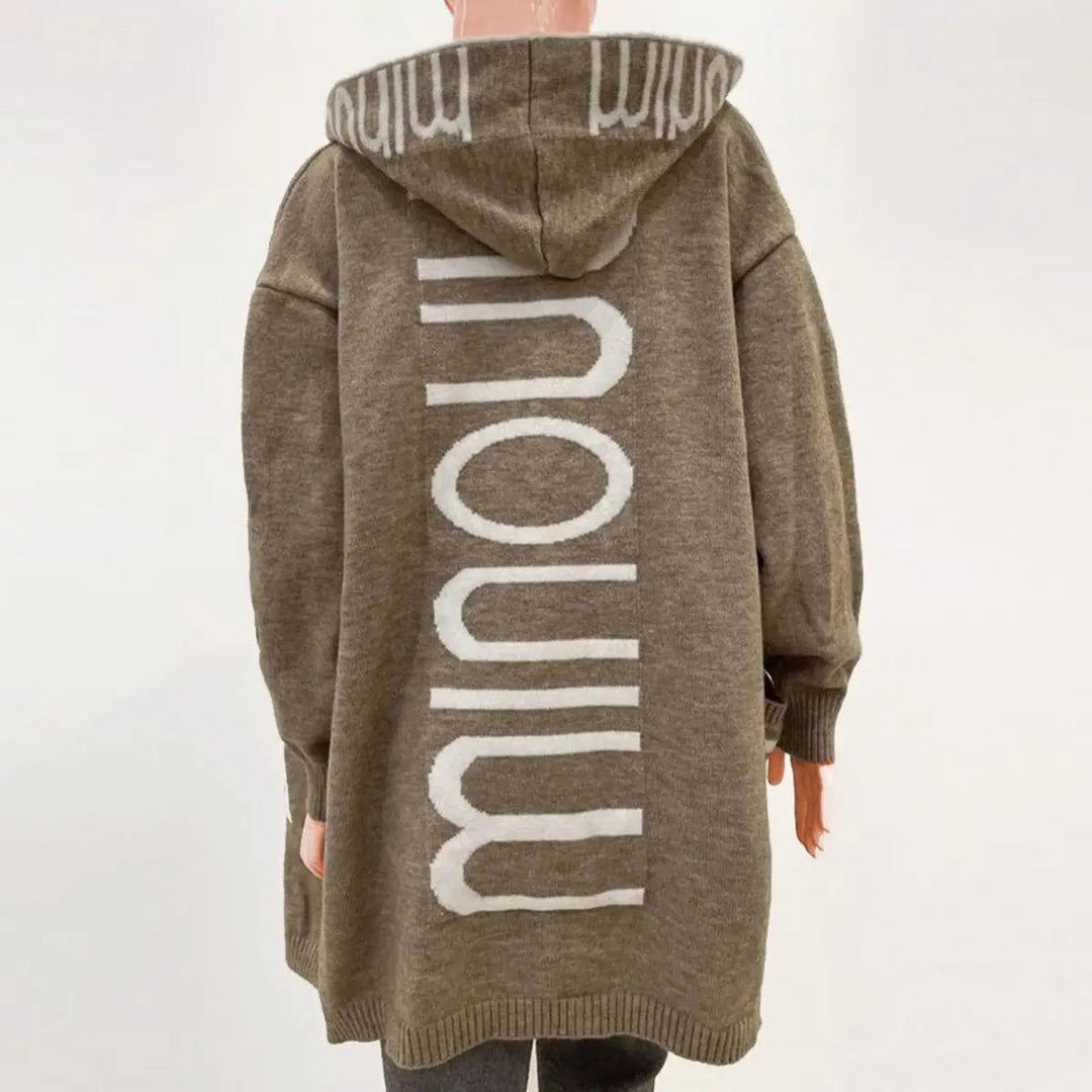 Stylish women's quilted longline hooded cardigan. Open-front knit with deep pockets for casual comfort.