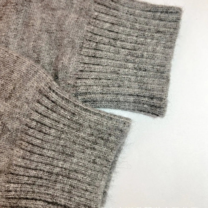 Cozy women's quilted longline hooded cardigan. Open-front knit jacket, ideal for fall & winter casual comfort.