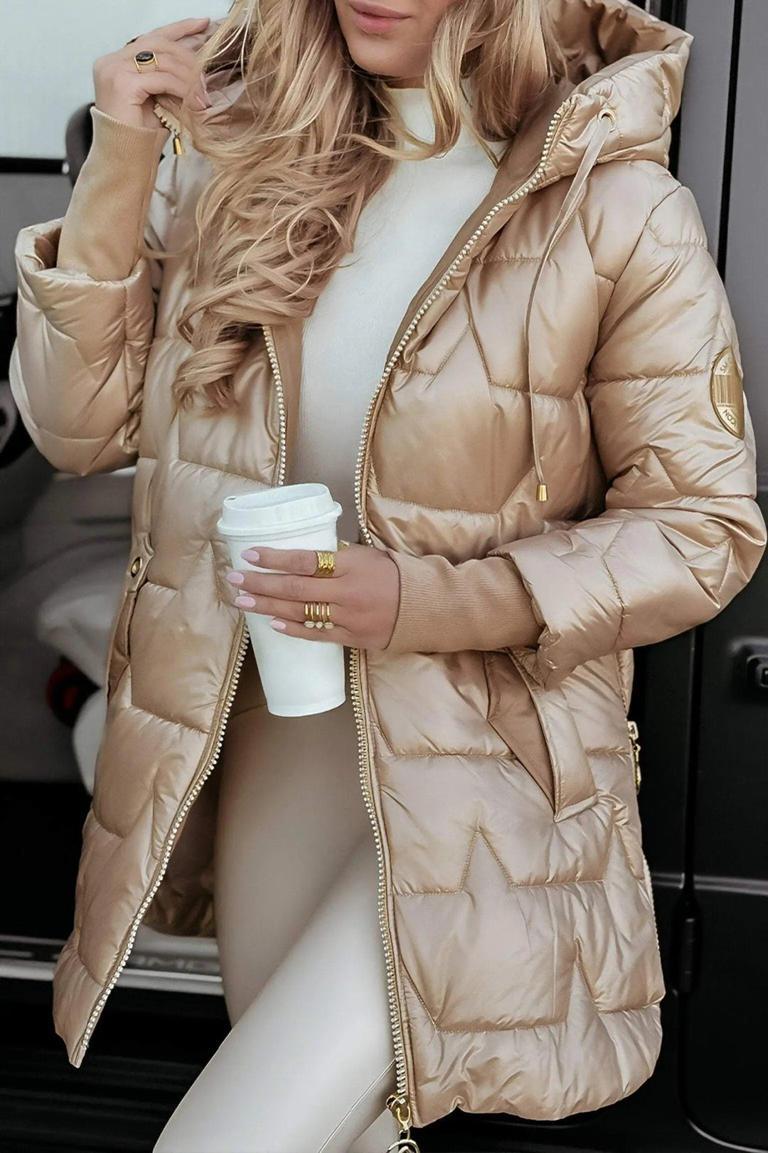 Women's cozy hooded puffer jacket, front view. Stylish & warm outerwear for winter & autumn.
