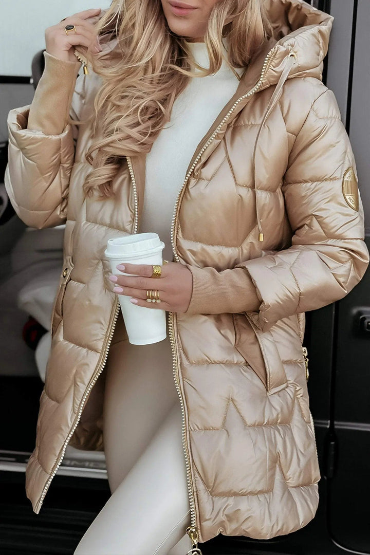 Women's cozy hooded puffer jacket, front view. Stylish & warm outerwear for winter & autumn.