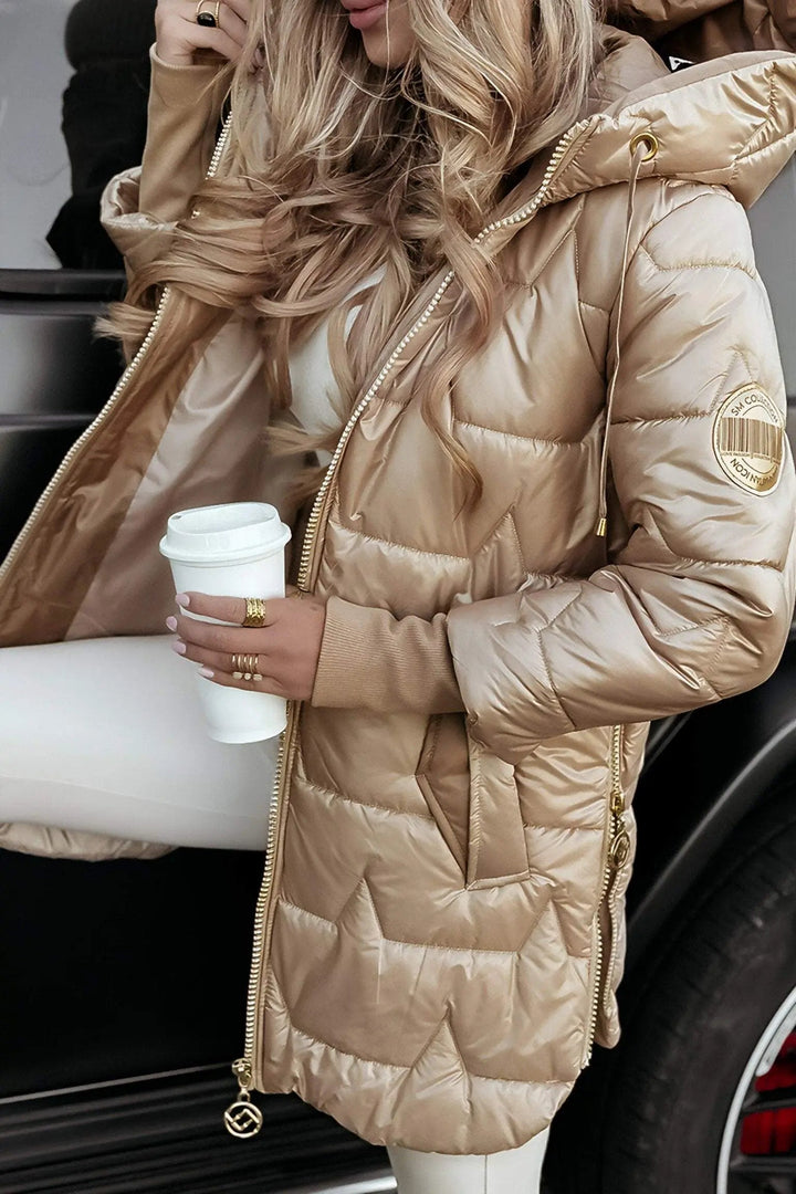 Women's hooded puffer jacket, suitable for harsh winter and trendy autumn fashion, offering cozy warmth.