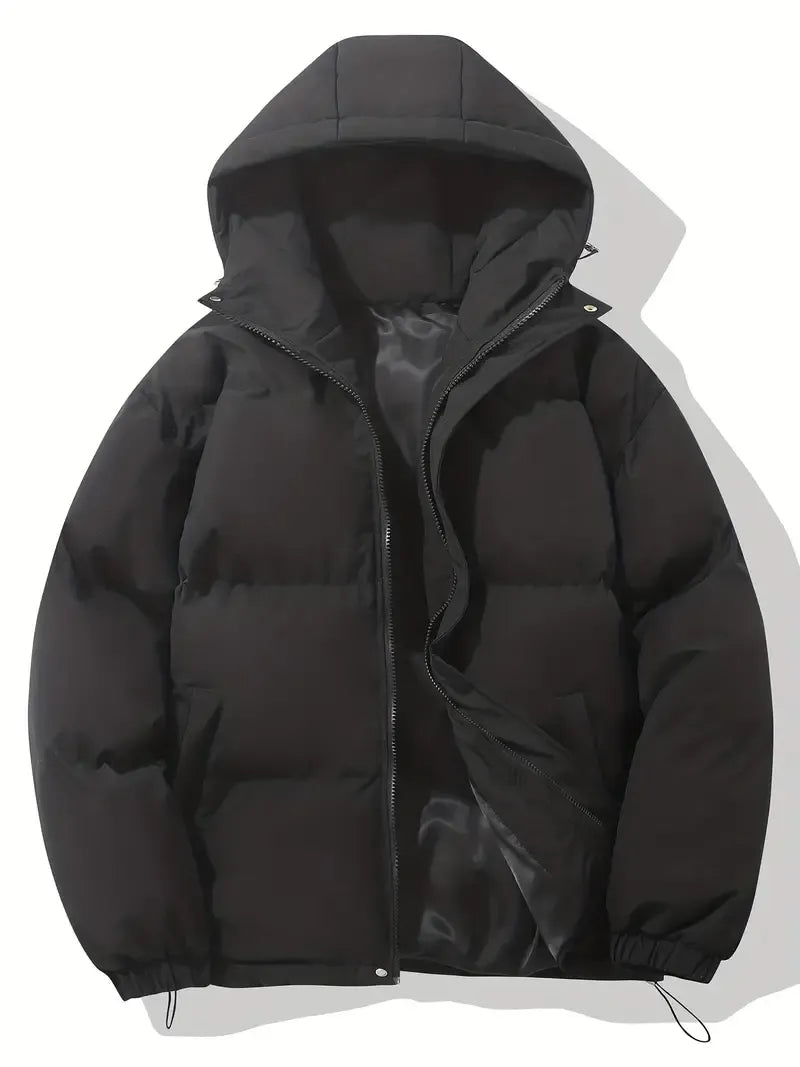 Women's cozy hooded puffer jacket in black, ideal for winter. Warm, quilted outerwear for cold weather fashion.