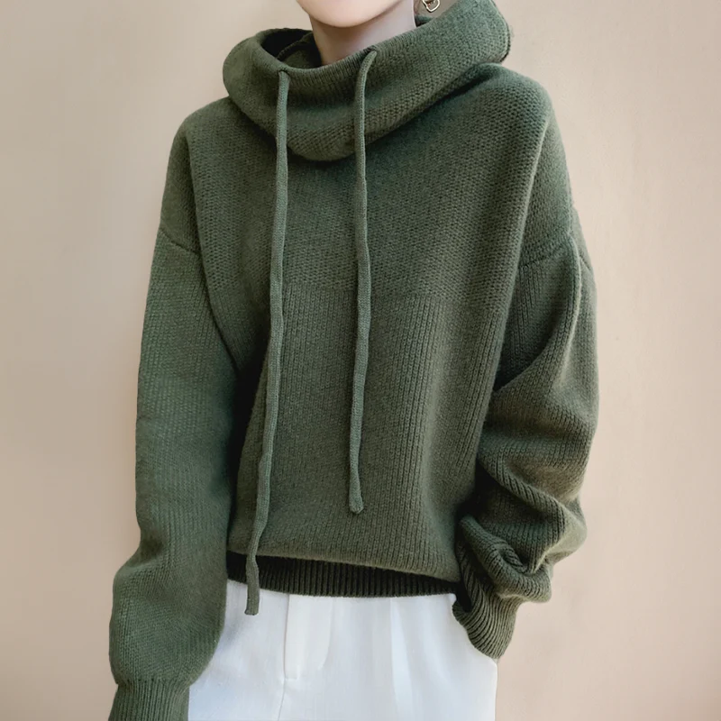 Cozy women's hooded sweater with relaxed fit, perfect for casual everyday wear & layering.