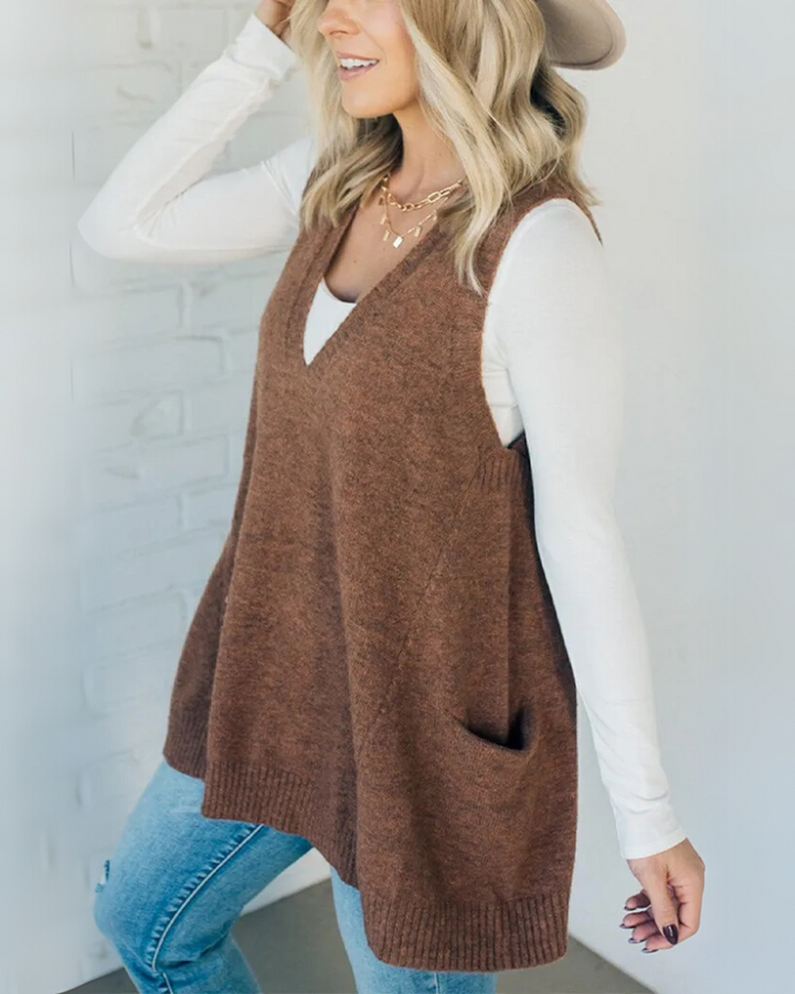 Flattering A-line women's knit vest. Soft, sleeveless layering piece for cozy casual wear.