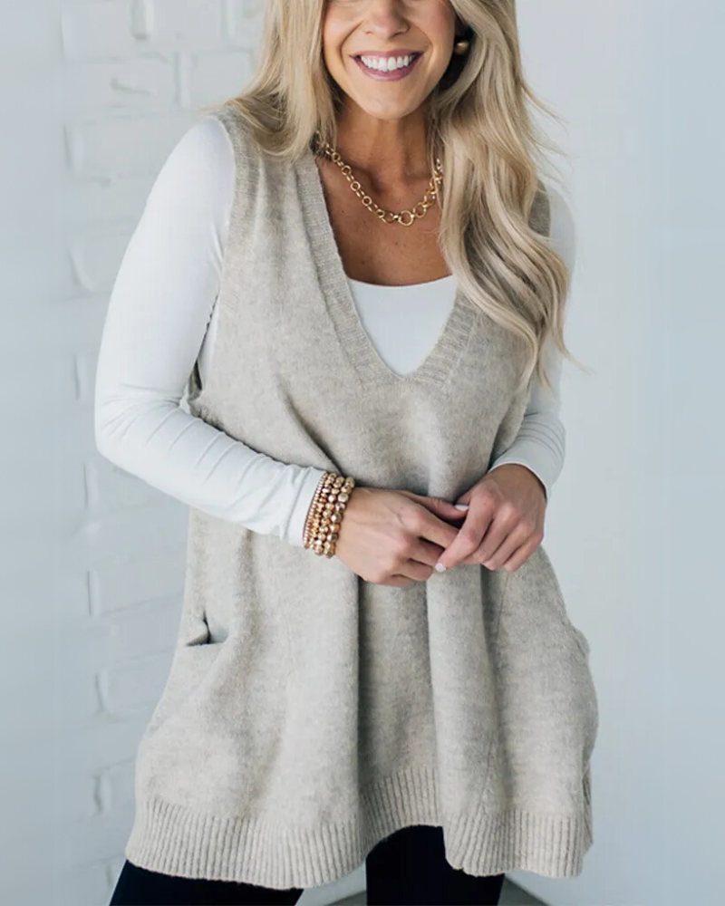 Stylish women's cozy knit vest, an A-line layering piece for casual autumn and winter outfits.