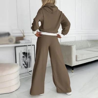 Close-up of soft knit fabric on a woman's comfy hoodie and wide-leg lounge pants.
