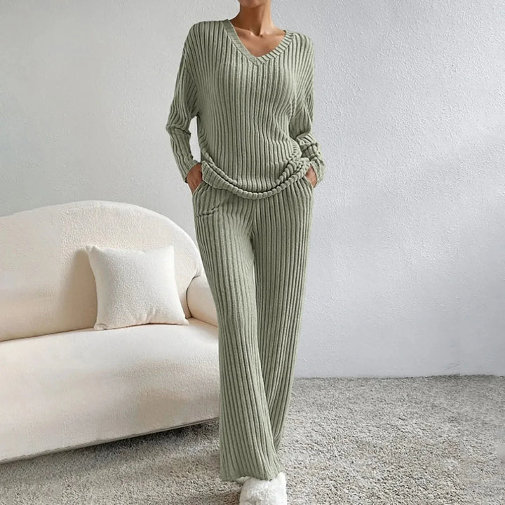 Women's cozy knit loungewear, two-piece set with a flattering V-neck top and wide leg pants.