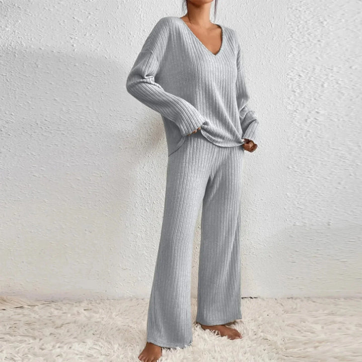 Chic women's knit loungewear set featuring a soft V-neck top & stylish wide leg pants.