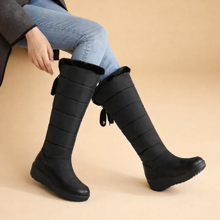 Warm women's lace-up winter boots, combining cozy comfort with elegant style for fall & winter outfits.