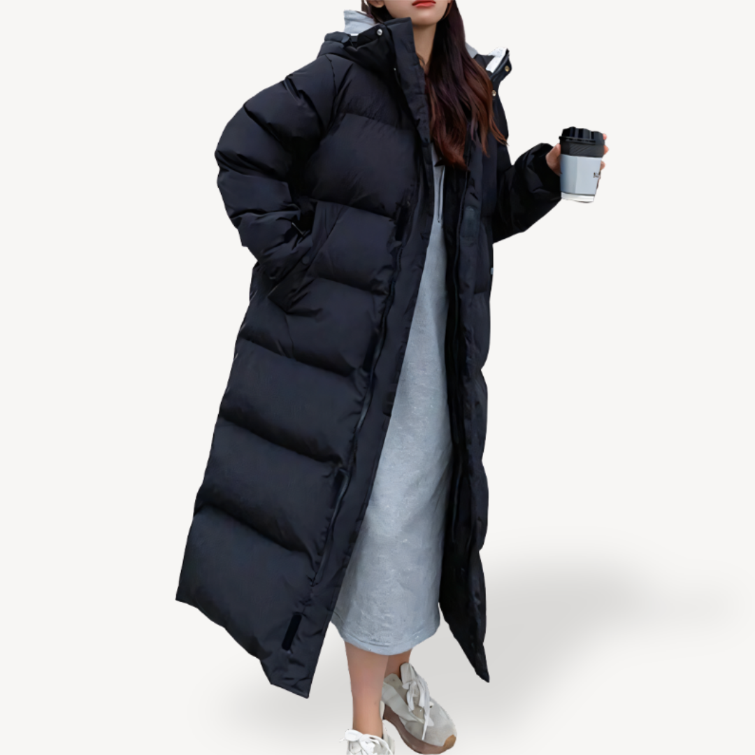Women's cozy oversized long puffer jacket for ultimate winter warmth, featuring a stylish quilted design.