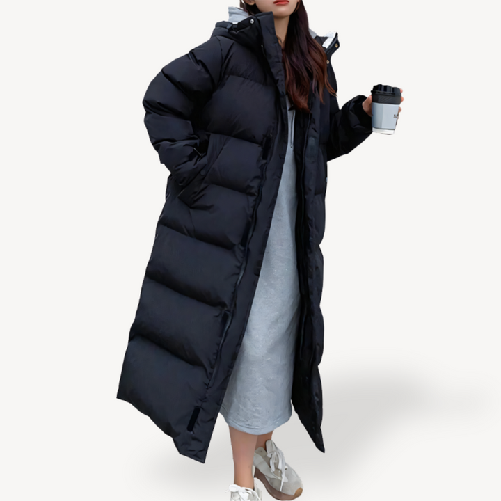 Women's cozy oversized long puffer jacket for ultimate winter warmth, featuring a stylish quilted design.