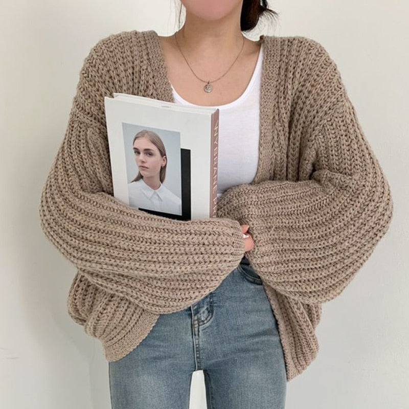 Women's cozy oversized open front cardigan with stylish balloon sleeves, perfect for fall layering.
