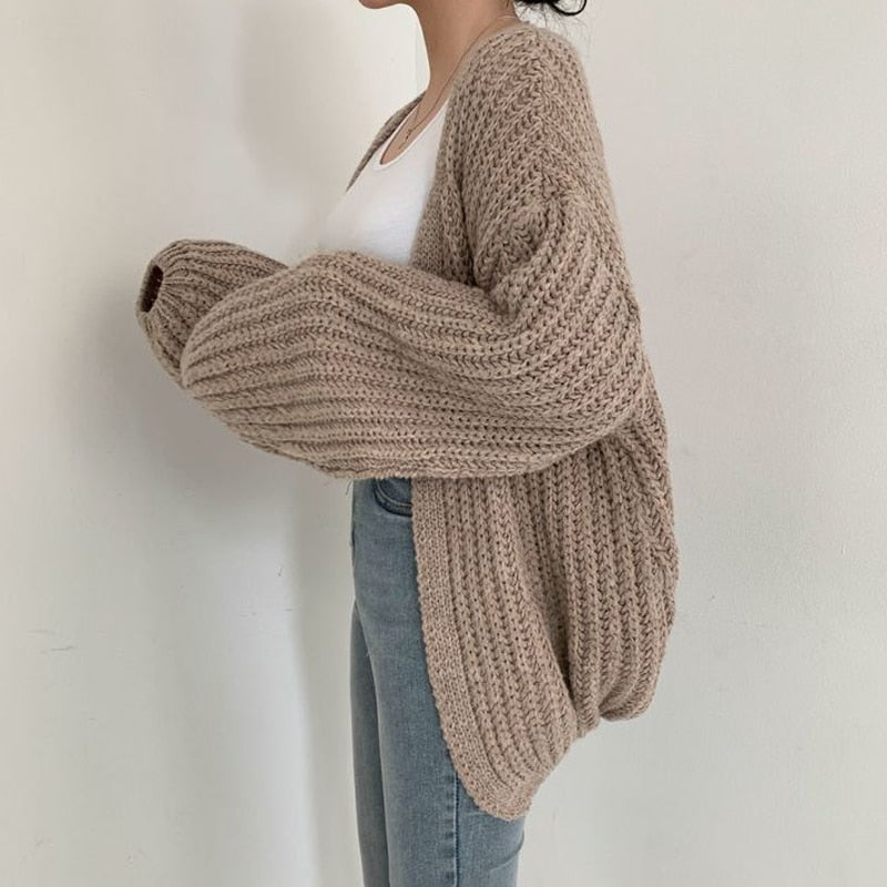 Soft, cozy women's relaxed fit cardigan with balloon sleeves and an open front, great for winter wear.